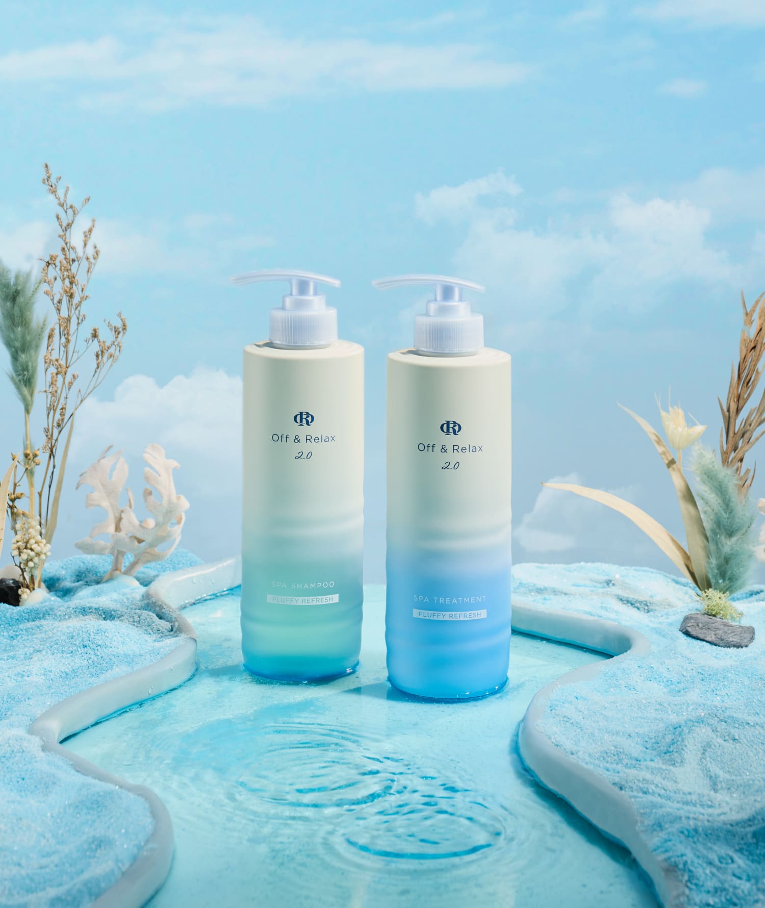 Off and Relax Fluffy Refresh spa shampoo and treatment styled with blue sand and water